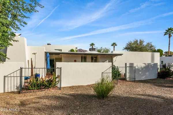 a view of a swimming pool with a lounge chairs