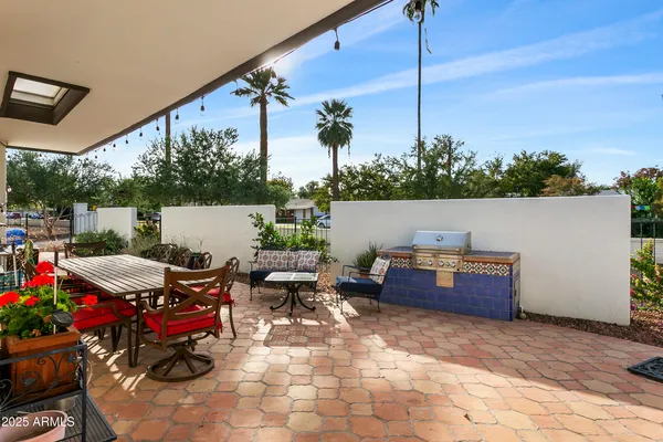 a outdoor space with lots of tables and chairs