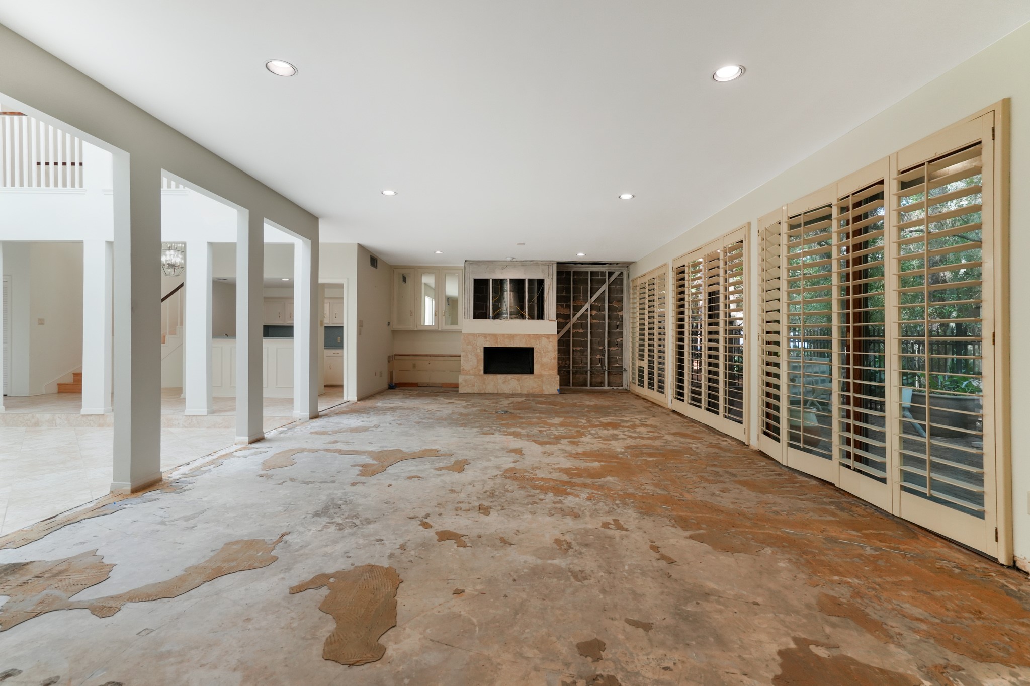 201 Vanderpool Lane, Unit 65 Houston, TX 77024 - Photo 14 of 34 a view of a livingroom with wooden floor and furniture