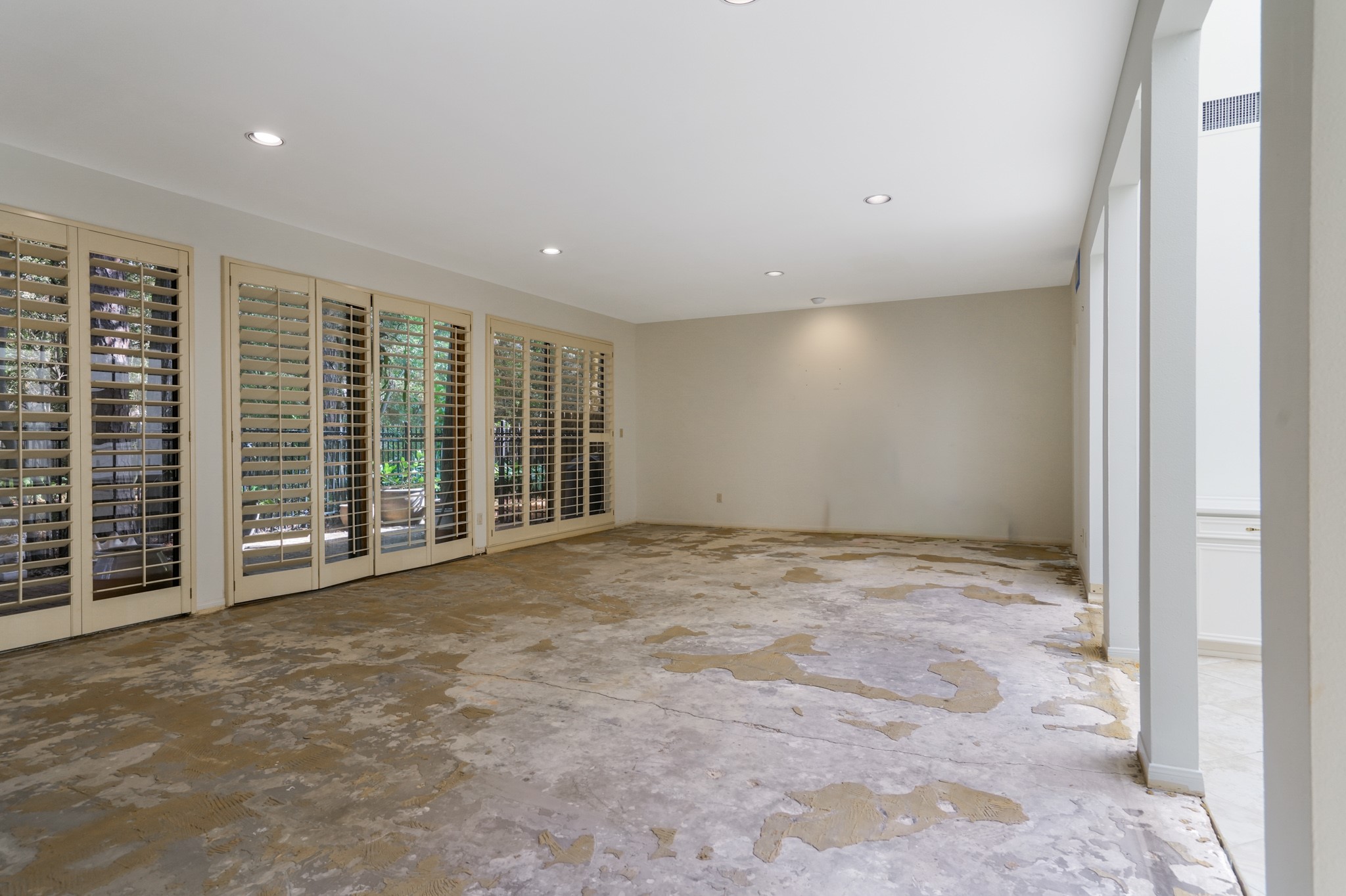 201 Vanderpool Lane, Unit 65 Houston, TX 77024 - Photo 18 of 34 a view of an empty room with a balcony