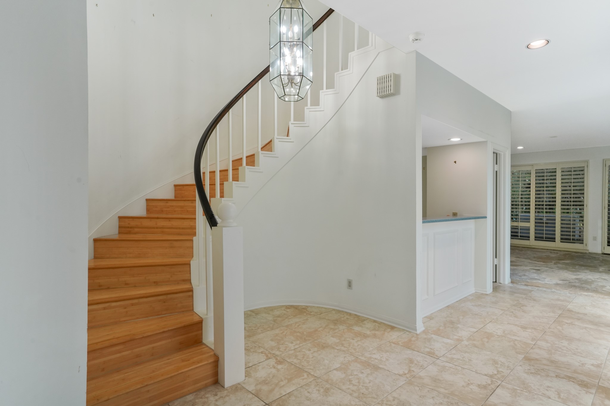 201 Vanderpool Lane, Unit 65 Houston, TX 77024 - Photo 22 of 34 a view of entryway and hall with wooden floor