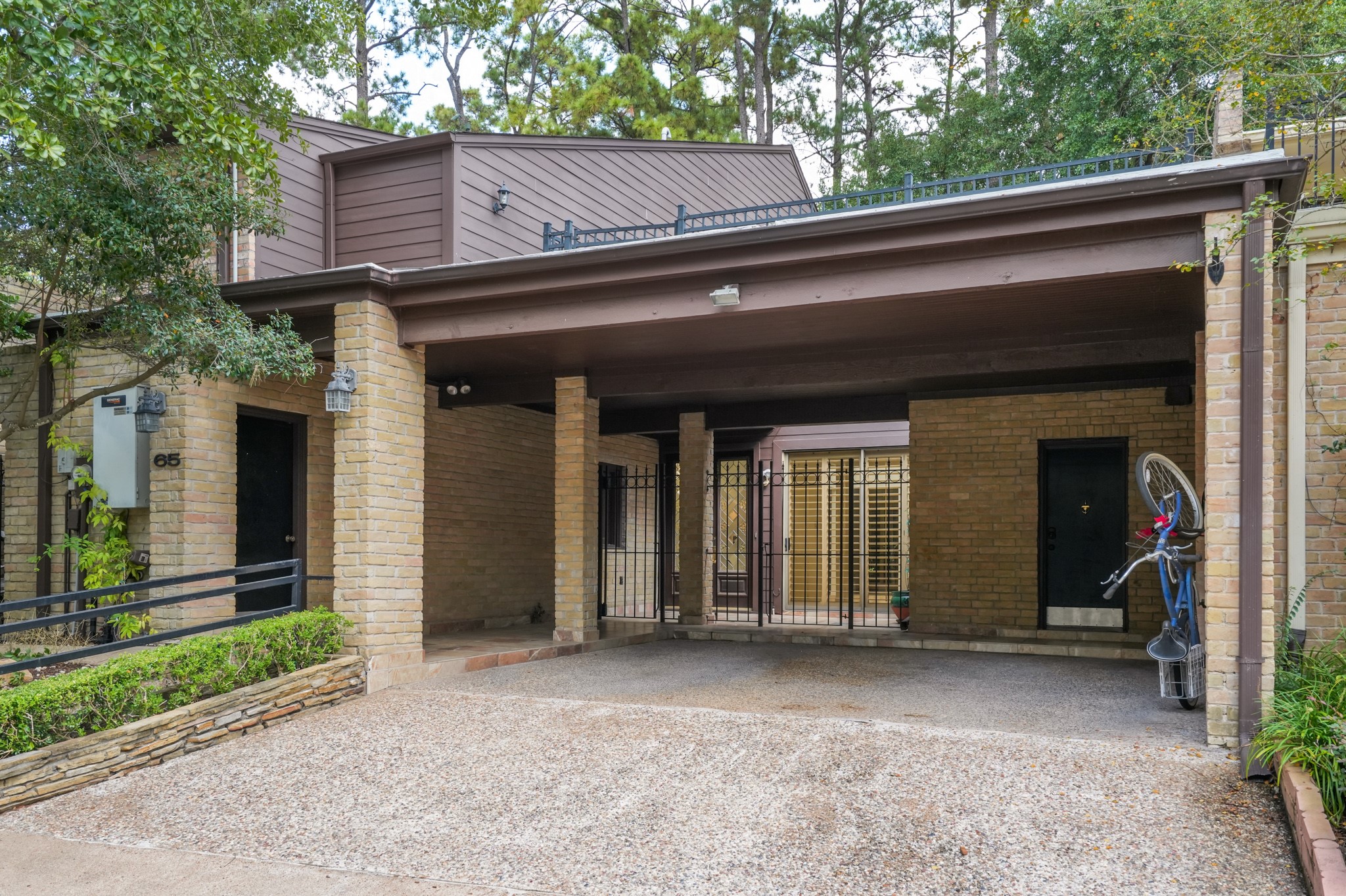 201 Vanderpool Lane, Unit 65 Houston, TX 77024 - Photo 3 of 34 a view of a house with a entrance