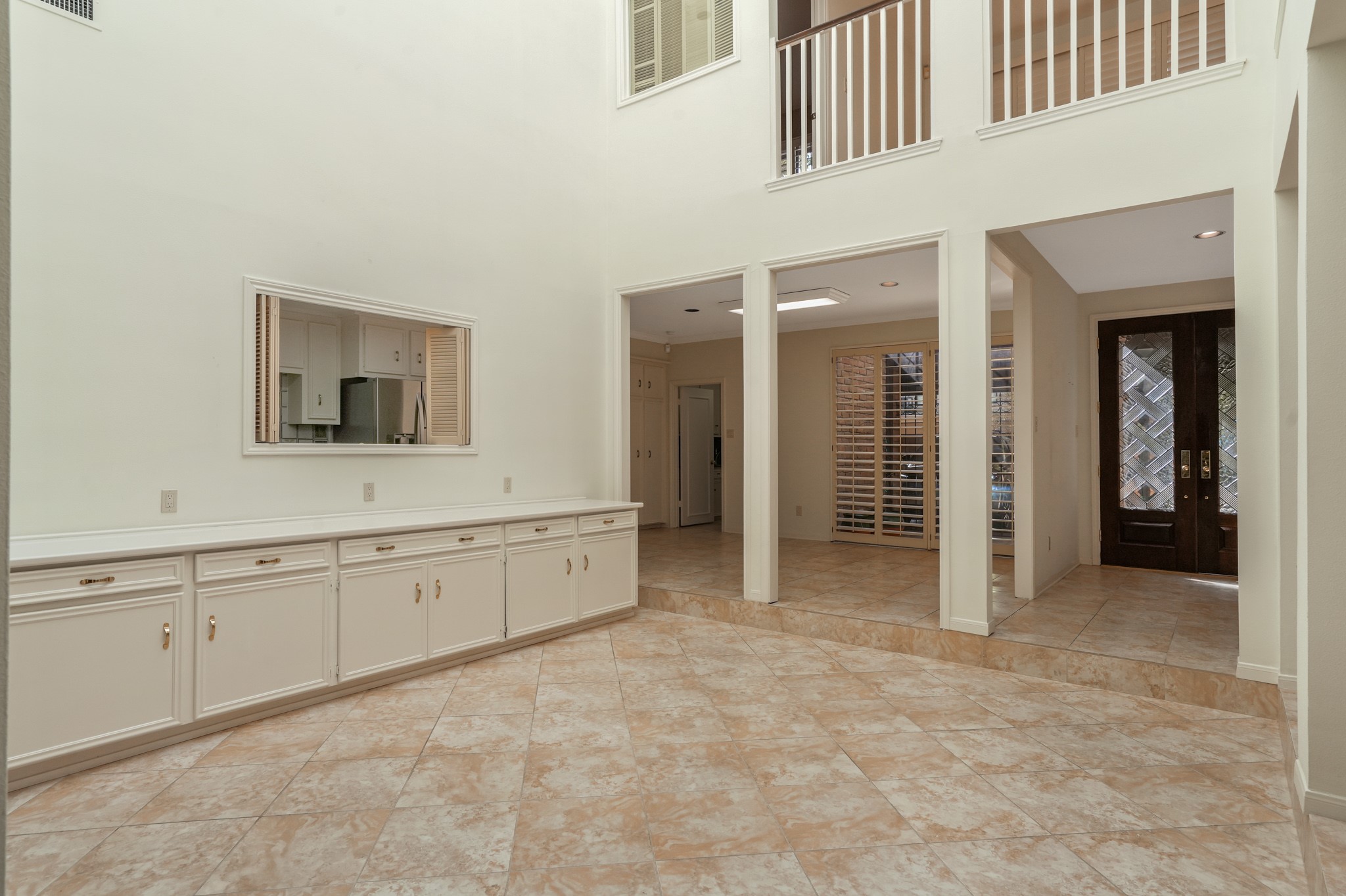 201 Vanderpool Lane, Unit 65 Houston, TX 77024 - Photo 32 of 34 a bathroom with a sink and a mirror