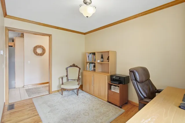 a bedroom with furniture and a window