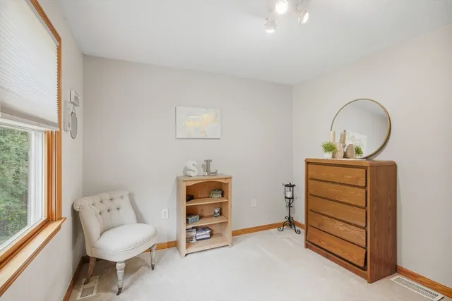 a living room with furniture and a white couch