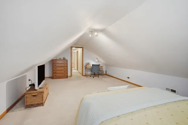 a picture of a book and a bed