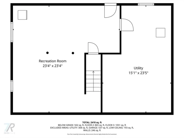 a backyard of a house with fire pit and chairs
