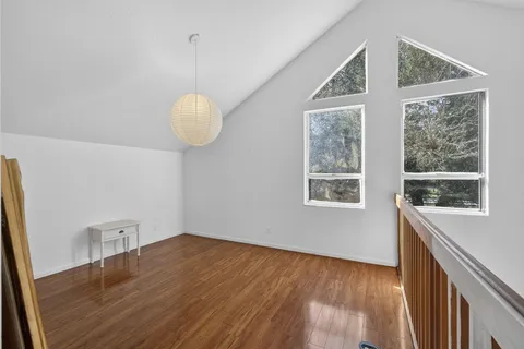 a view of livingroom with furniture and wooden floor