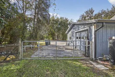 a backyard of a house with lots of green space