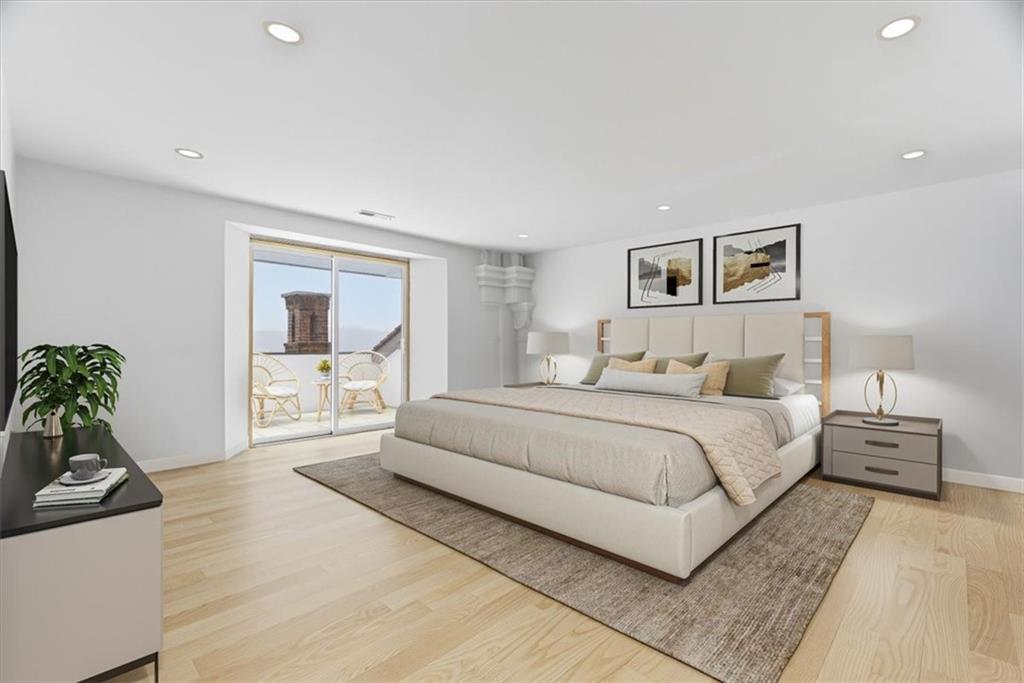 1 Pius Street, Unit A4 Pittsburgh, PA 15203 - Photo 27 of 40 virtually staged primary bedroom with balcony