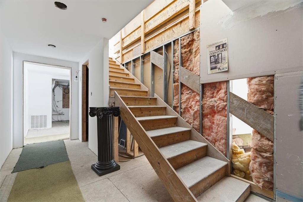 1 Pius Street, Unit A4 Pittsburgh, PA 15203 - Photo 3 of 40 stairway inside entry to upper level living space