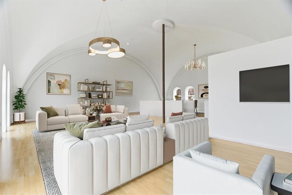 1 Pius Street, Unit A4 Pittsburgh, PA 15203 - Photo 8 of 40 virtually staged living room - TV nook