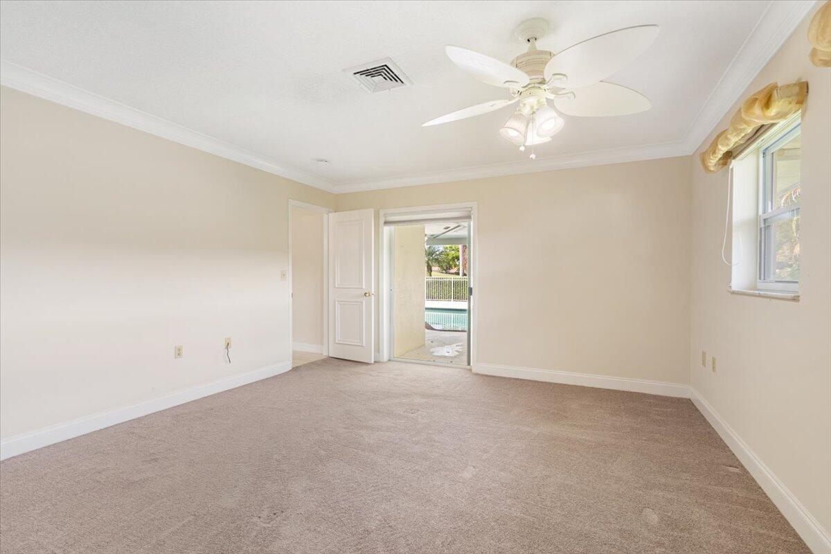3261 Southeast Fairway West Stuart, FL 34997 - Photo 12 of 44 a view of an empty room with a window