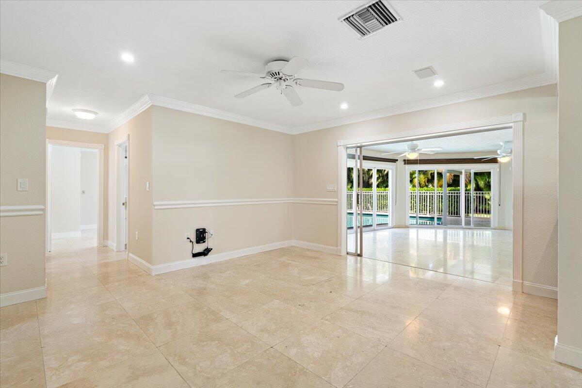 3261 Southeast Fairway West Stuart, FL 34997 - Photo 30 of 44 a view of an empty room with a window