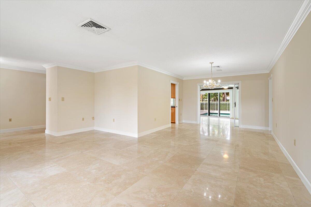 3261 Southeast Fairway West Stuart, FL 34997 - Photo 6 of 44 wooden floor in an empty room with a window