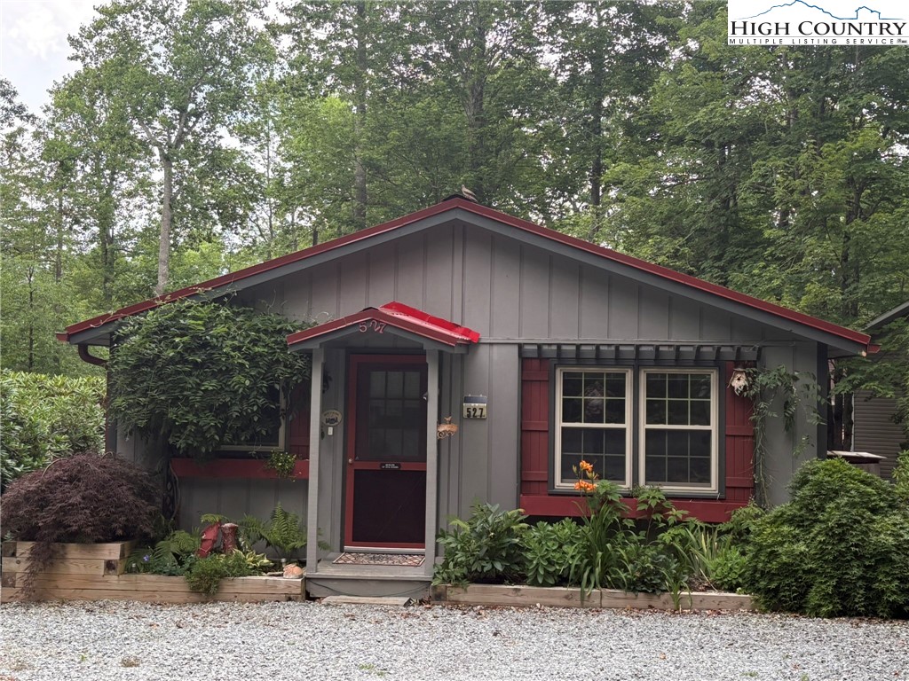 527 Windridge Road Newland, NC 28657 - Photo 2 of 33 a house with a tree in front of it