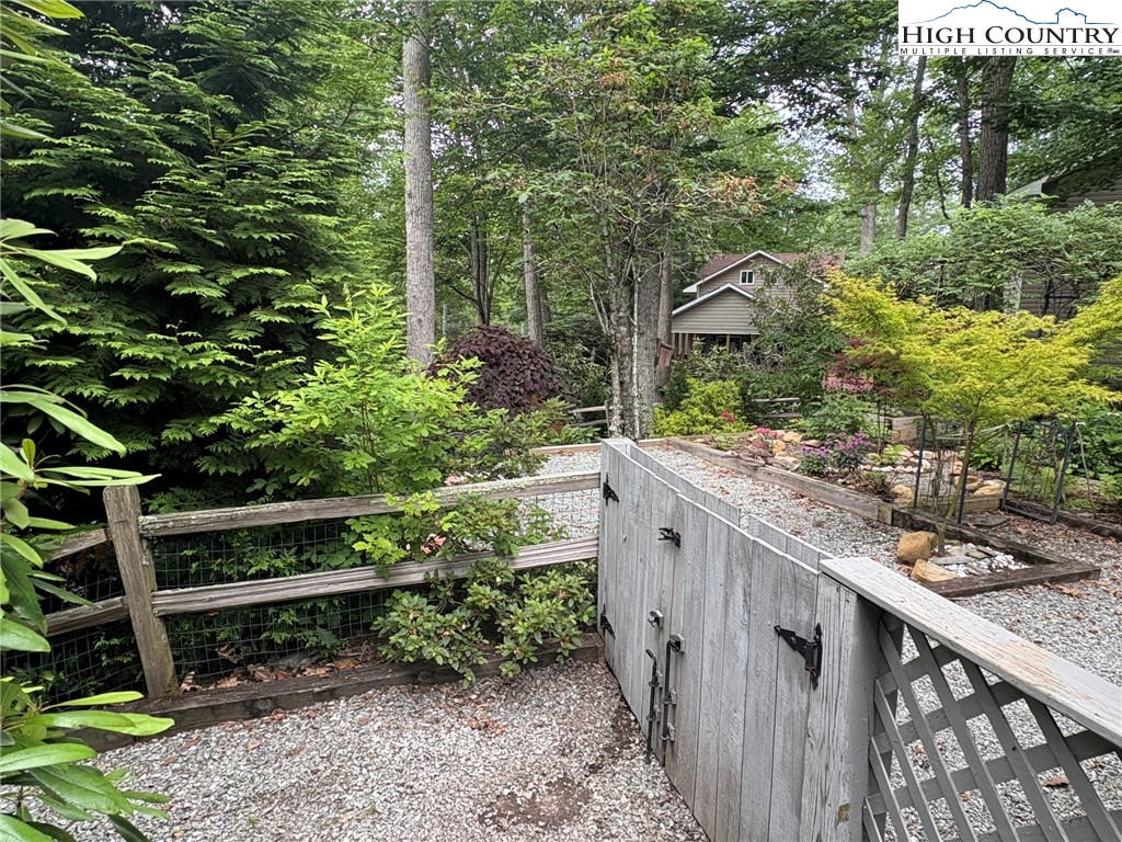 527 Windridge Road Newland, NC 28657 - Photo 27 of 33 a view of a wooden fence and trees