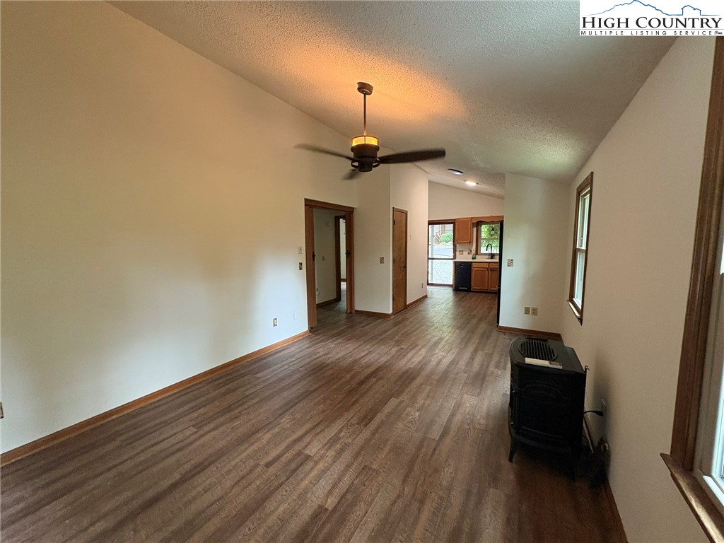 527 Windridge Road Newland, NC 28657 - Photo 10 of 33 a view of empty room with wooden floor