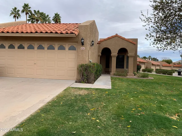 a view of a house with a garden