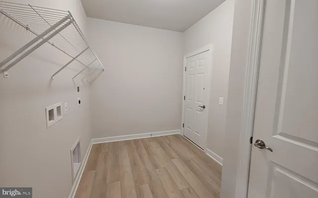 a bathroom with a double vanity sink mirror and shower