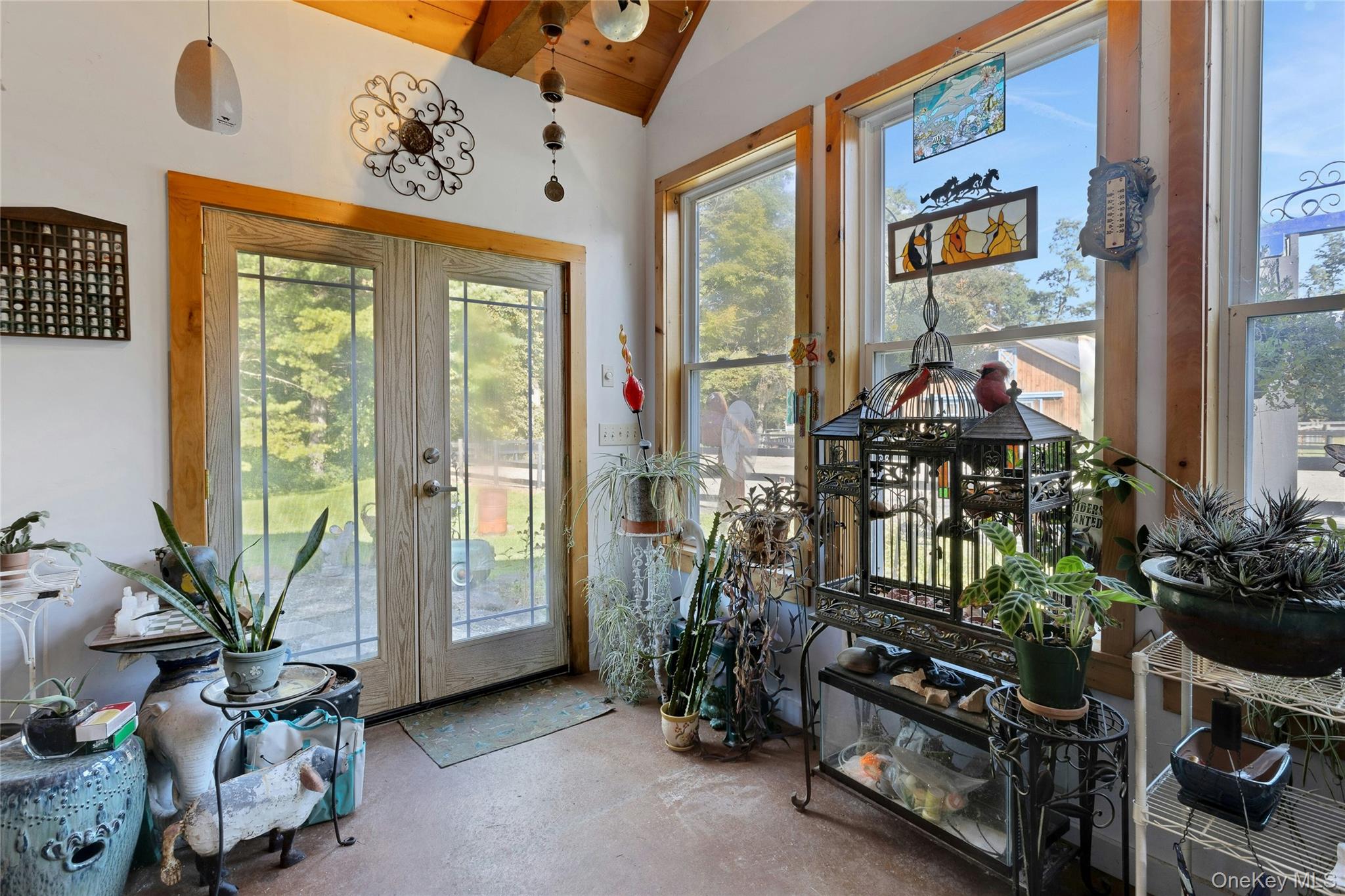 73 Lake Ellis Road Wingdale, NY 12594 - Photo 11 of 41 Doorway featuring french doors, concrete floors, and wooden ceiling