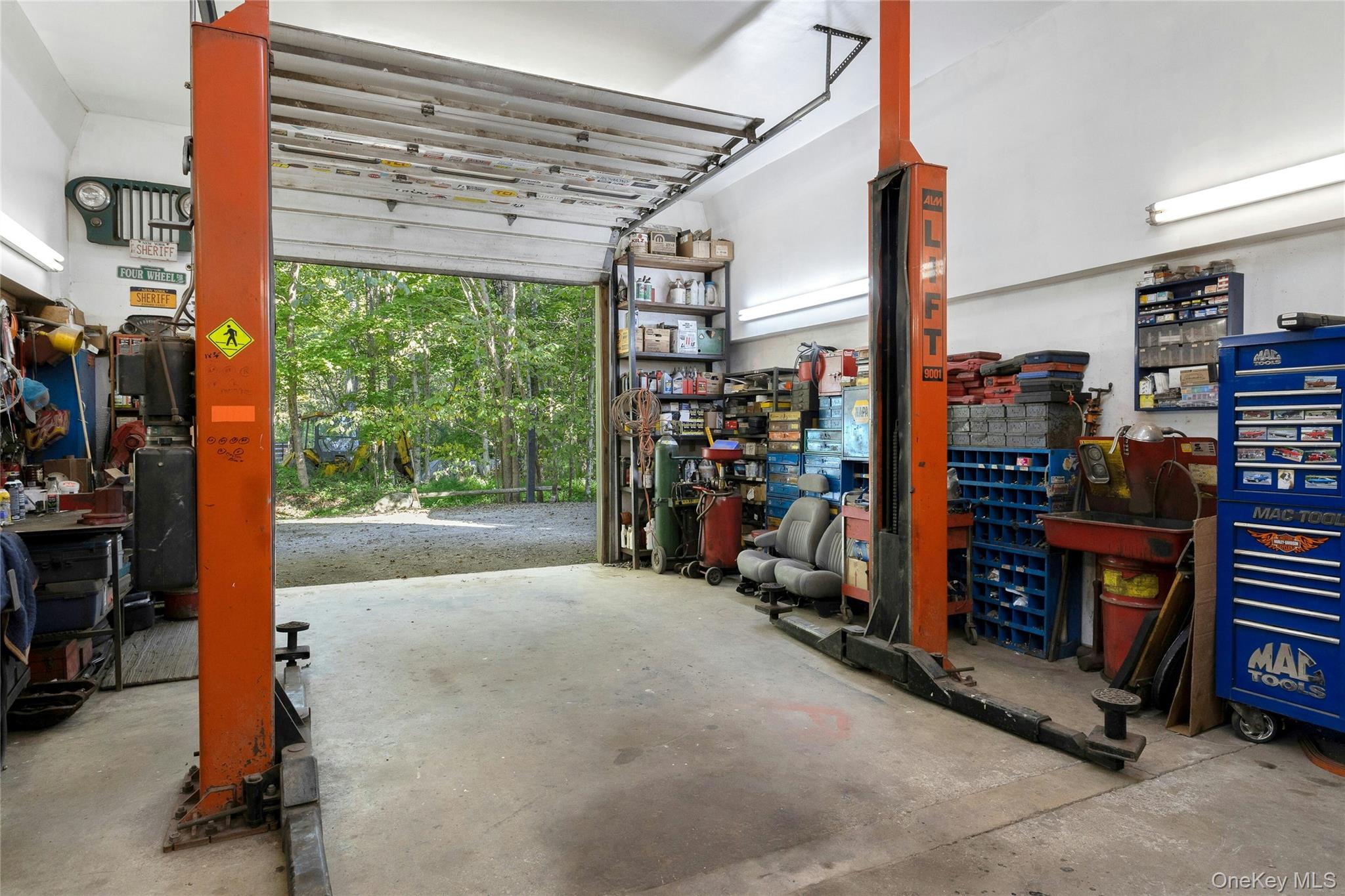 73 Lake Ellis Road Wingdale, NY 12594 - Photo 28 of 41 Garage featuring a workshop area