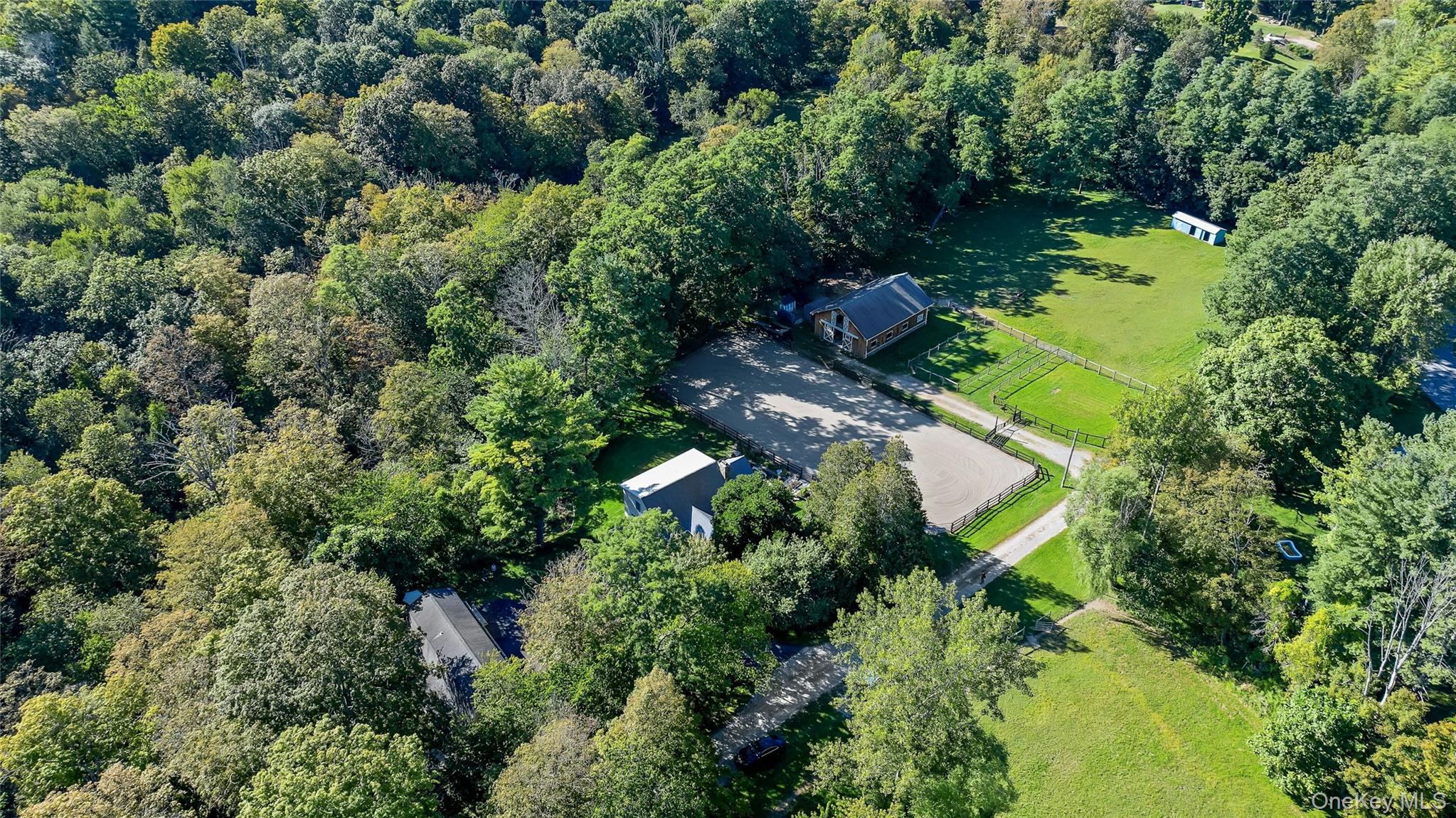 73 Lake Ellis Road Wingdale, NY 12594 - Photo 34 of 41 View of property location with a heavily wooded area