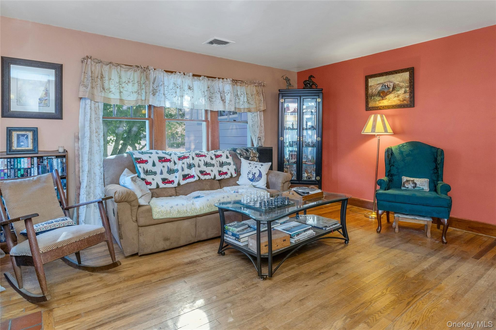 73 Lake Ellis Road Wingdale, NY 12594 - Photo 4 of 41 Living room featuring baseboards and wood finished floors
