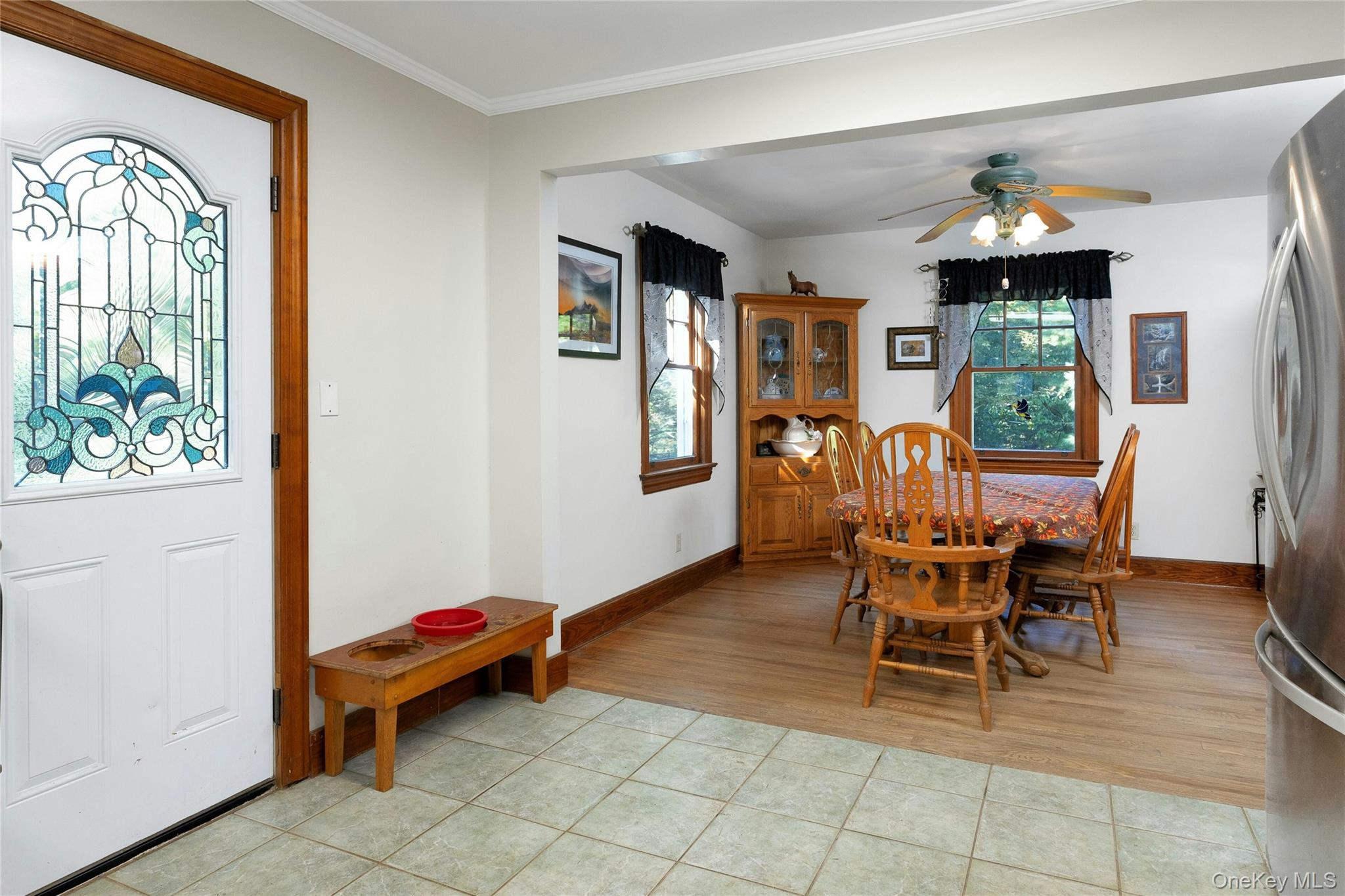 73 Lake Ellis Road Wingdale, NY 12594 - Photo 5 of 41 Dining room with ceiling fan, light tile patterned floors, and crown molding