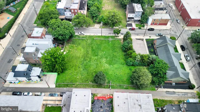 an aerial view of a house with a garden