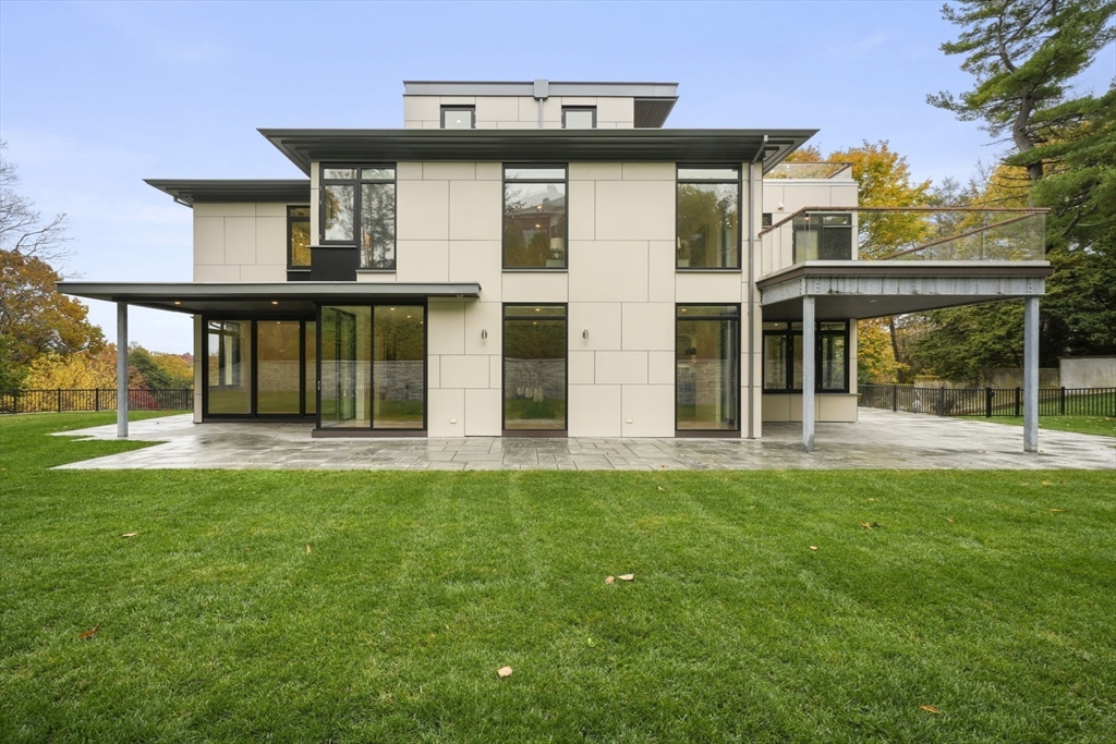 31 Catlin Road Brookline, MA 02445 - Photo 20 of 20 front view of a house with a yard