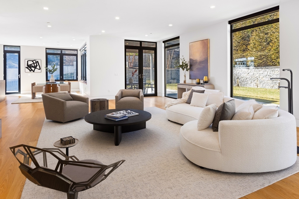 31 Catlin Road Brookline, MA 02445 - Photo 2 of 20 a living room with furniture and a large window