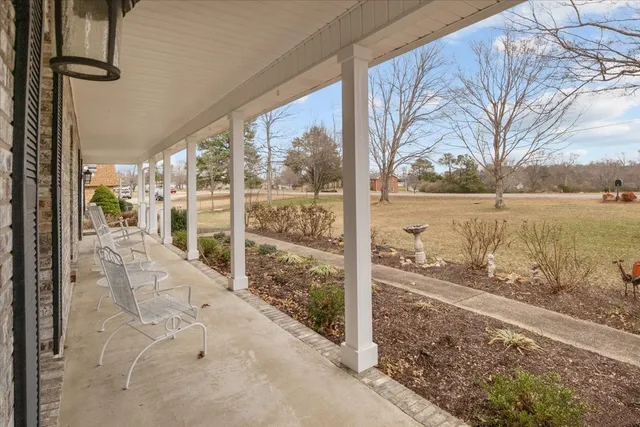 a view of a room with yard and balcony