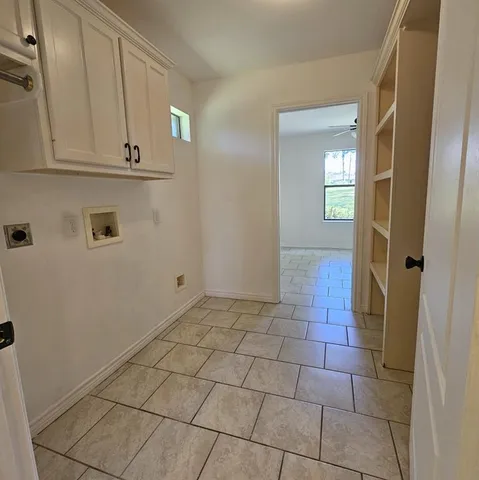 a view of a hallway with closet