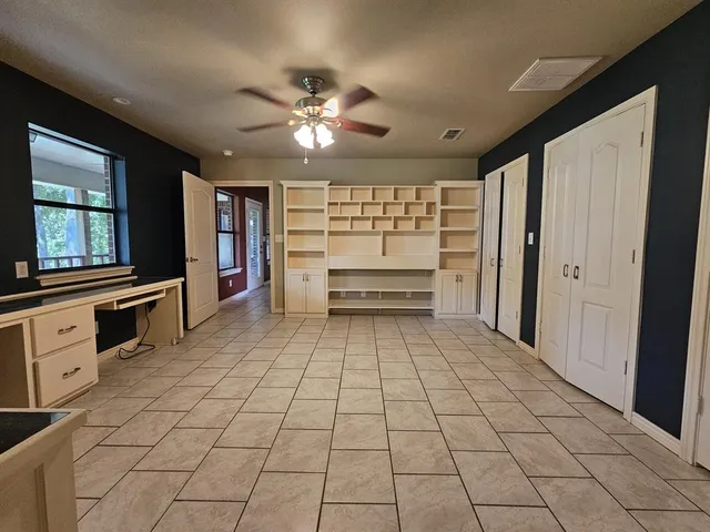 a view of a electric appliances and cabinets