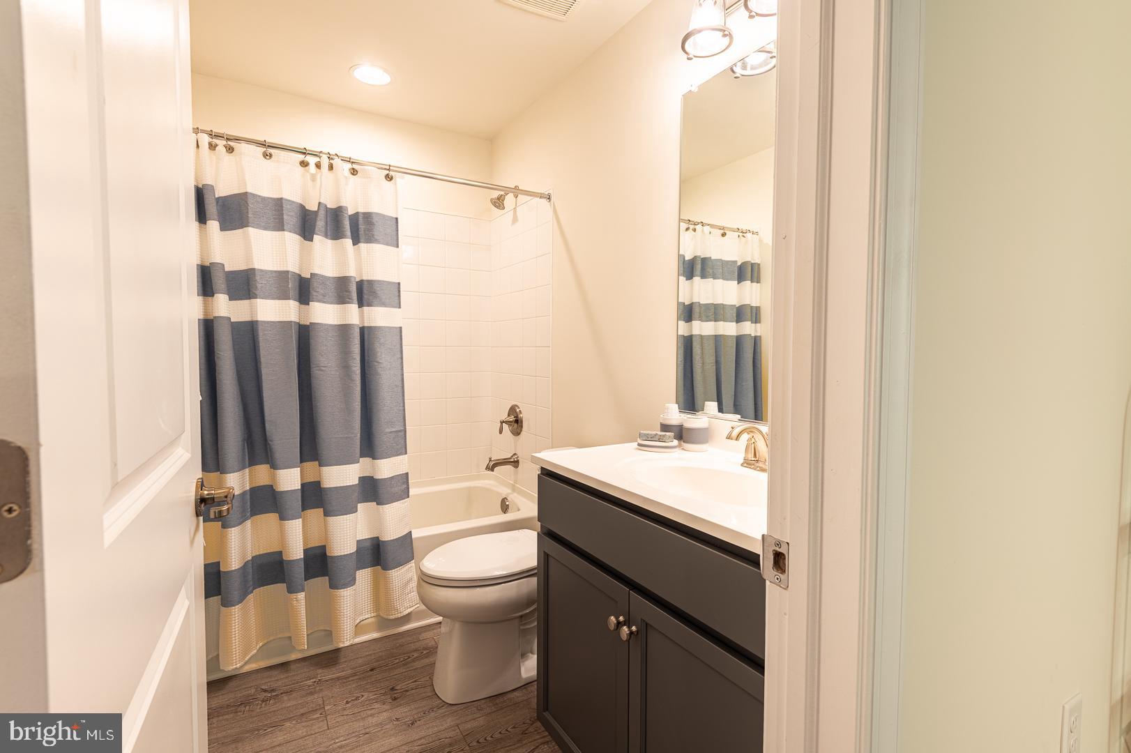 314 Tranquility Way Middletown, DE 19709 - Photo 35 of 56 a bathroom with a sink a toilet and shower
