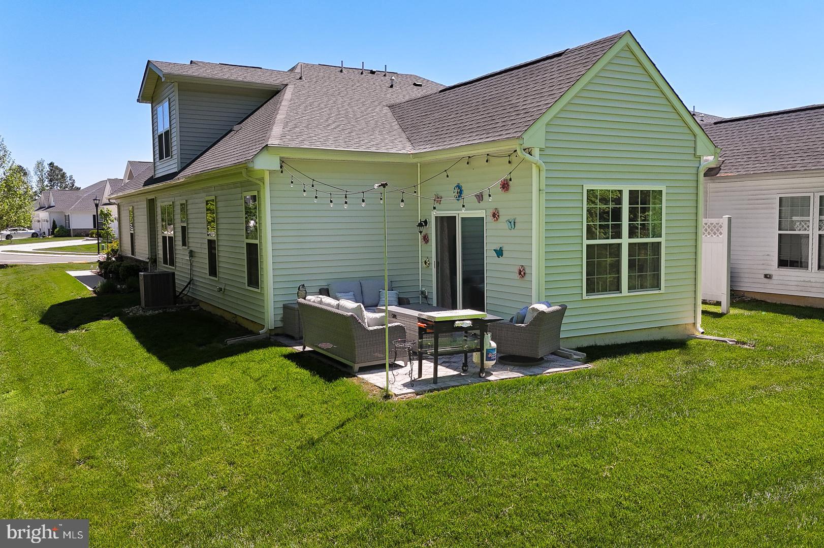 314 Tranquility Way Middletown, DE 19709 - Photo 40 of 56 a view of a house with a backyard