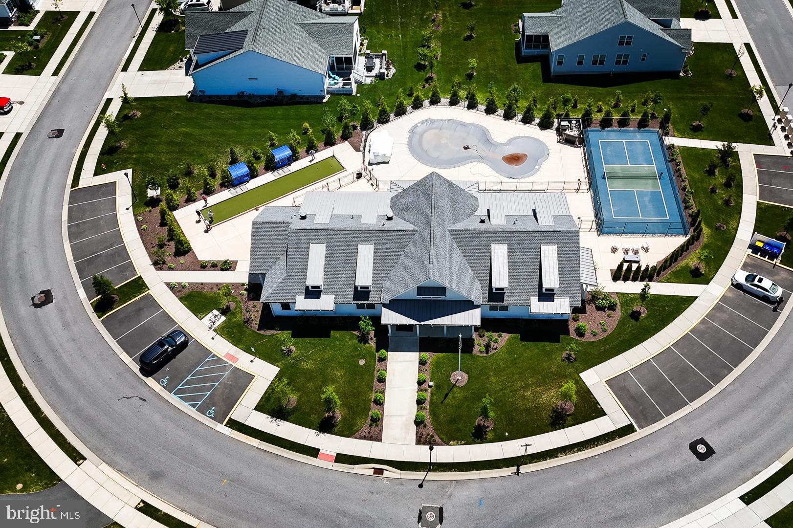 314 Tranquility Way Middletown, DE 19709 - Photo 42 of 56 a view of a swimming pool with sitting area