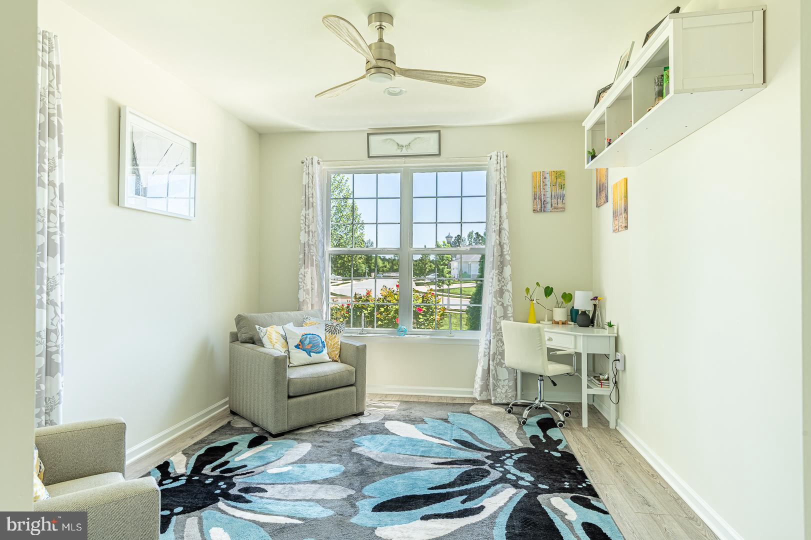 314 Tranquility Way Middletown, DE 19709 - Photo 9 of 56 a living room with furniture and a window