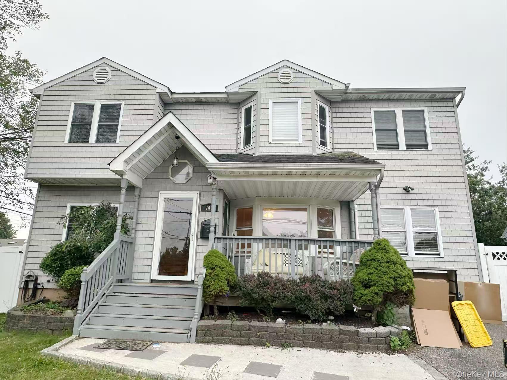 View of front of home with covered porch