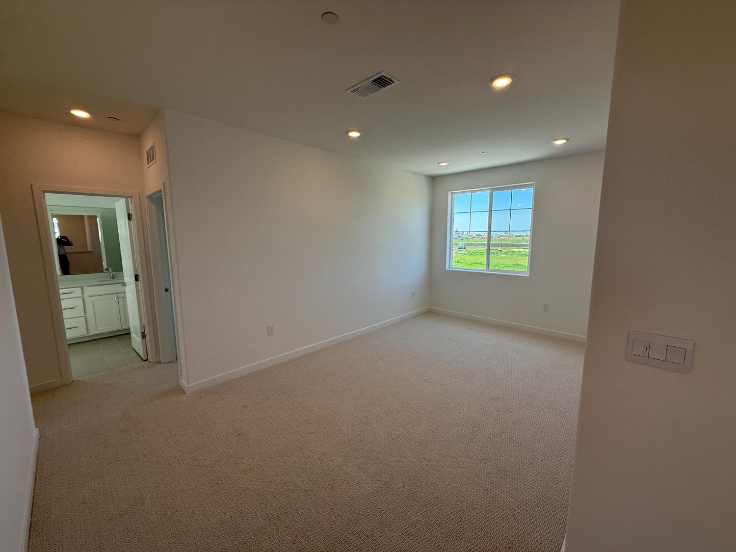 10355 Cadette Way Elk Grove, CA 95757 - Photo 4 of 15 an empty room with windows and closet