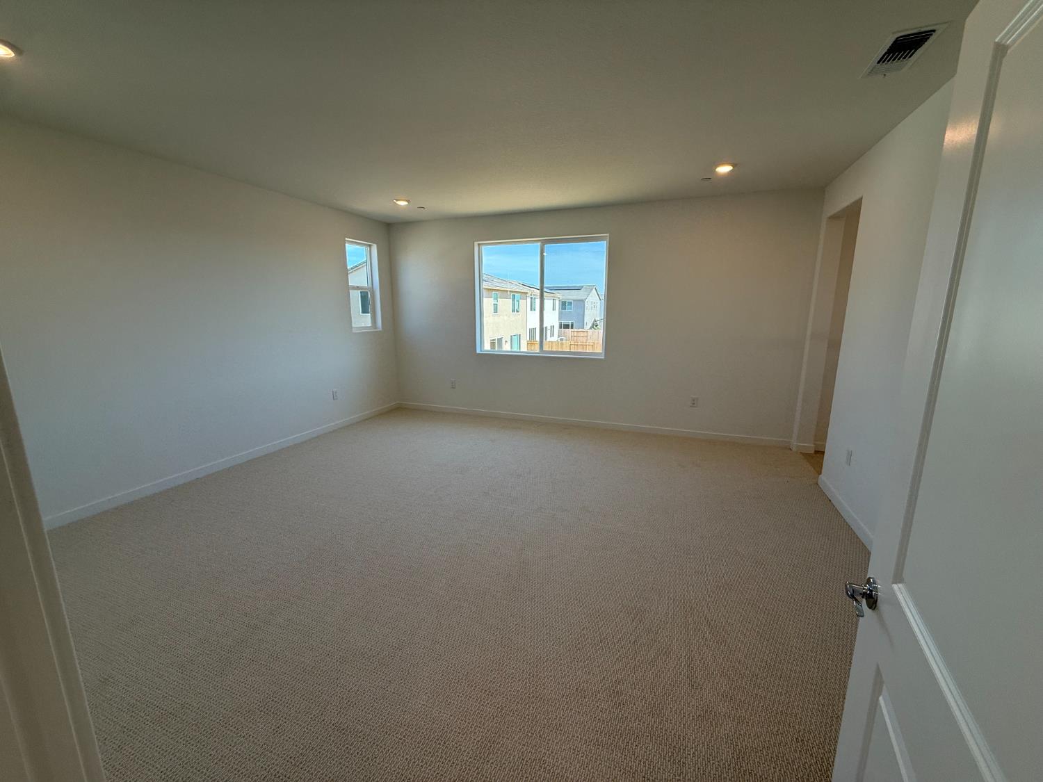 10355 Cadette Way Elk Grove, CA 95757 - Photo 5 of 15 an empty room with windows