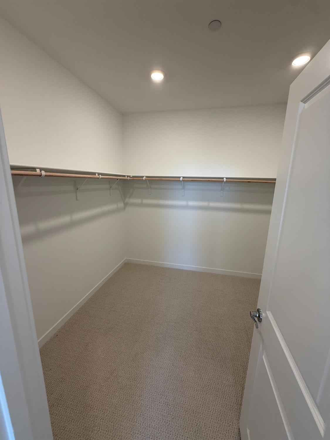 10355 Cadette Way Elk Grove, CA 95757 - Photo 7 of 15 an empty room with a shelf