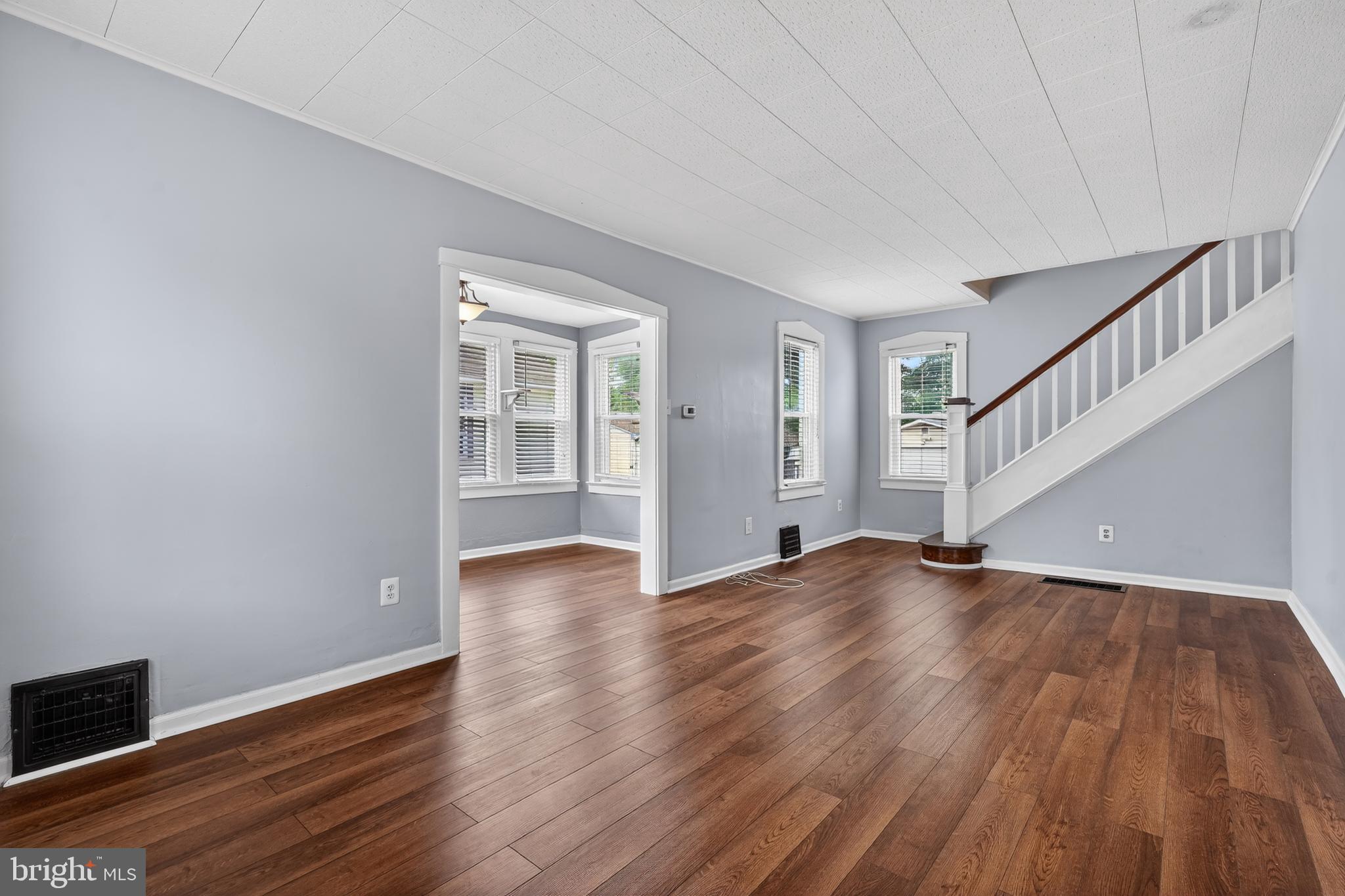 106 Ford Street Voorhees, NJ 08043 - Photo 5 of 36 a view of empty room with wooden floor and fan