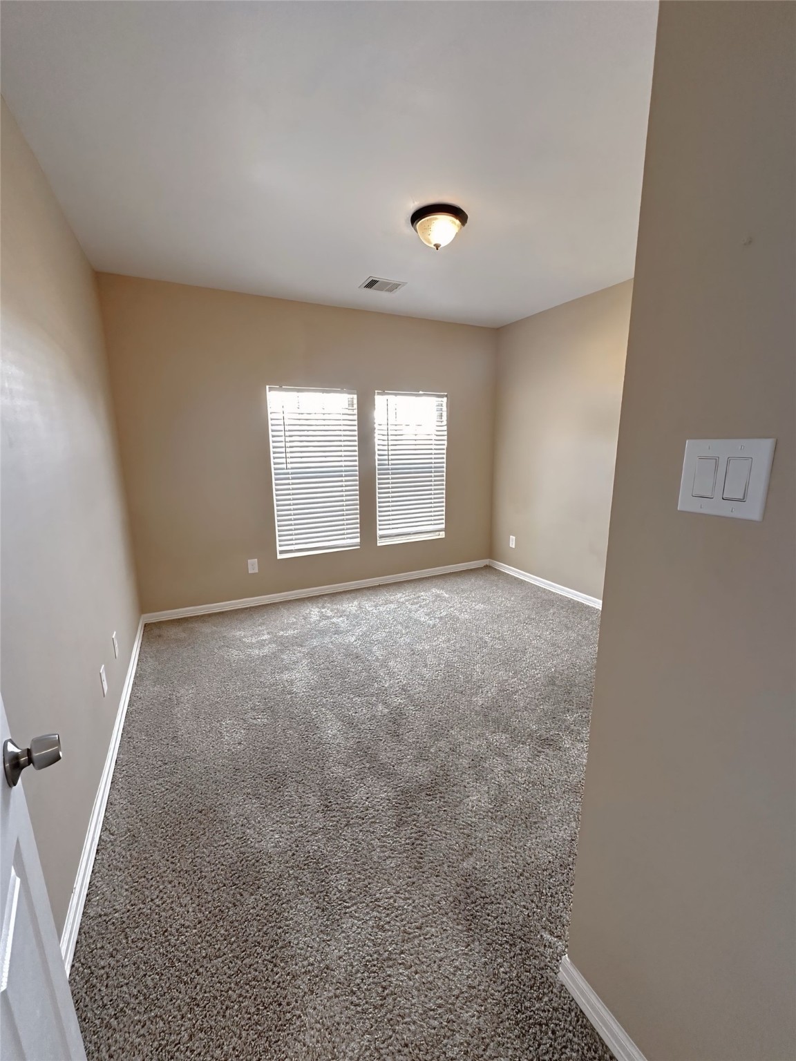 4146 Brinkley Street Houston, TX 77051 - Photo 8 of 9 an empty room with windows