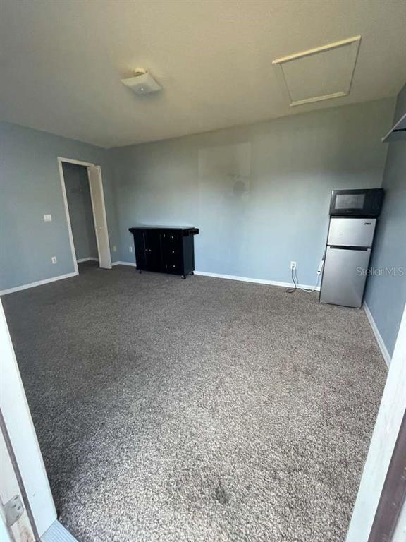 241 Caribbean Drive, Unit FRONT Davenport, FL 33897 - Photo 2 of 8 a view of empty room