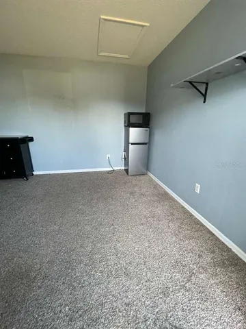 a view of a kitchen with a sink