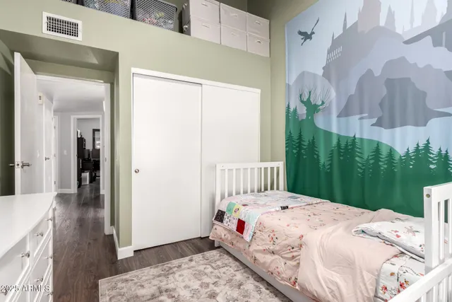 a view of a workspace with furniture and cabinet