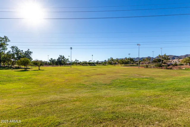 a view of a swimming pool with an ocean view