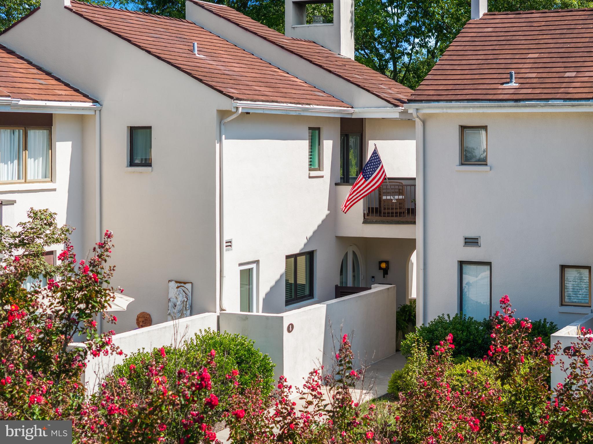 a front view of house with an outdoor space